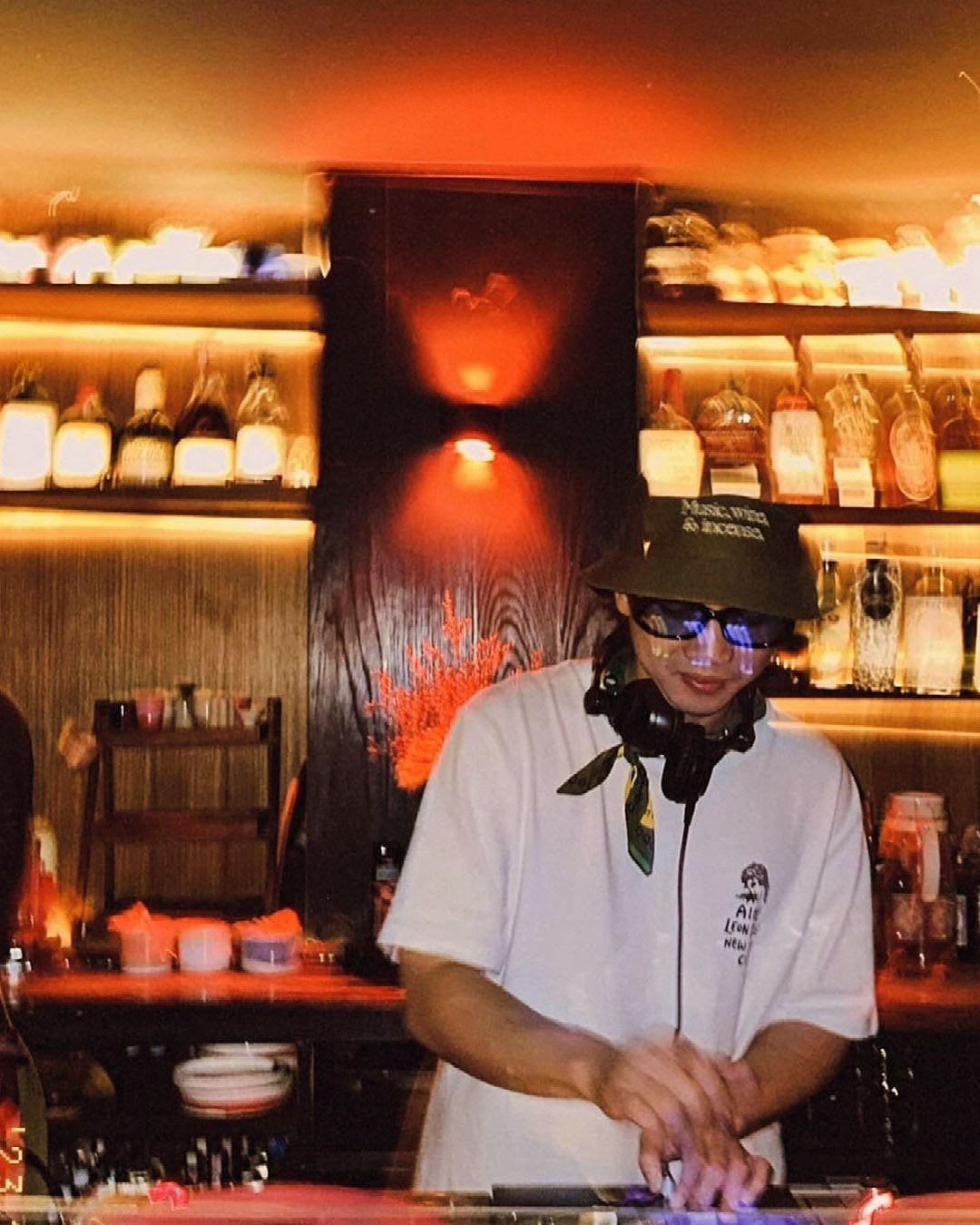 The best restaurants and bars in Bangkok's Thonglor | A DJ performs behind a set of decks at Thaipioka bar in Thonglor, Bangkok.