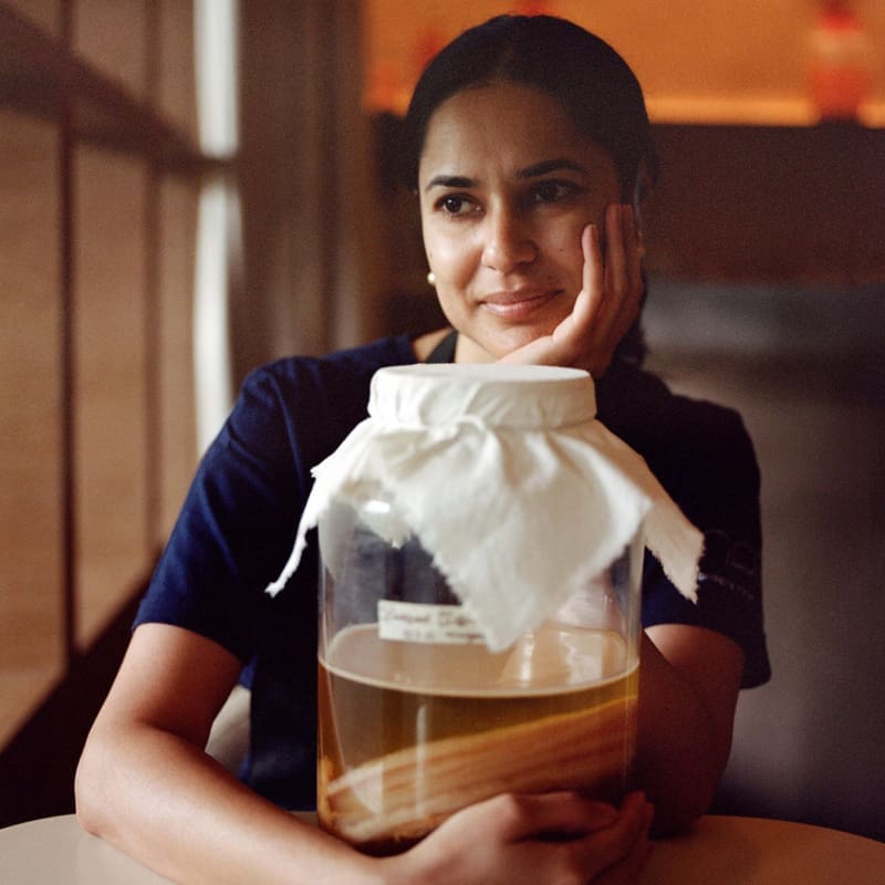 Vanika Choudhary, chef and founder at Noon in Mumbai, sat with a pickling jar. Photography by Ashish Shah