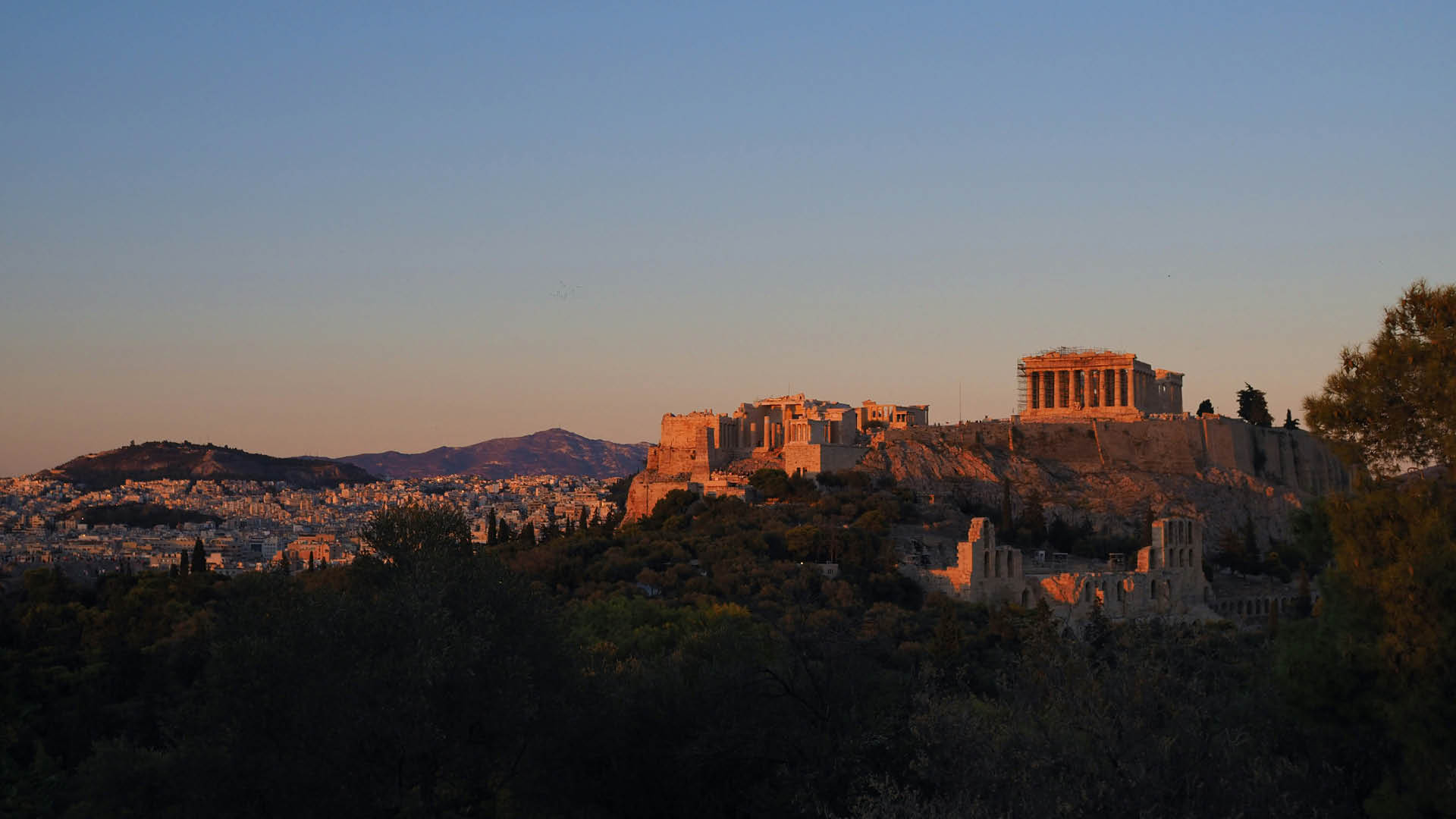 The Parthenon of Athens at dusk, as seen from Philopappos Hill
