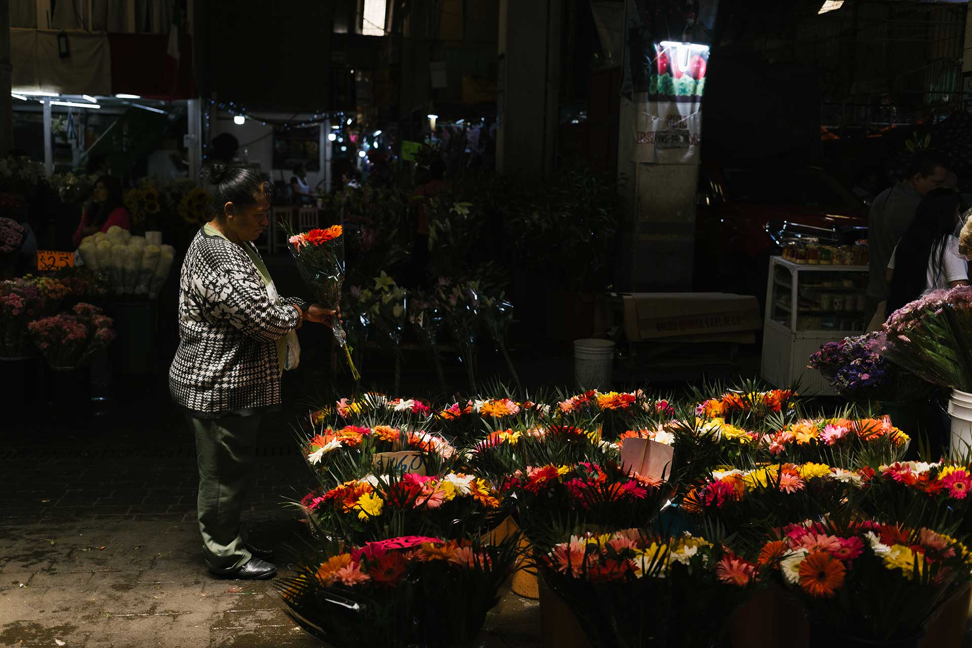 Vendors selling produce at Mercado de Jamaica, Mexico City