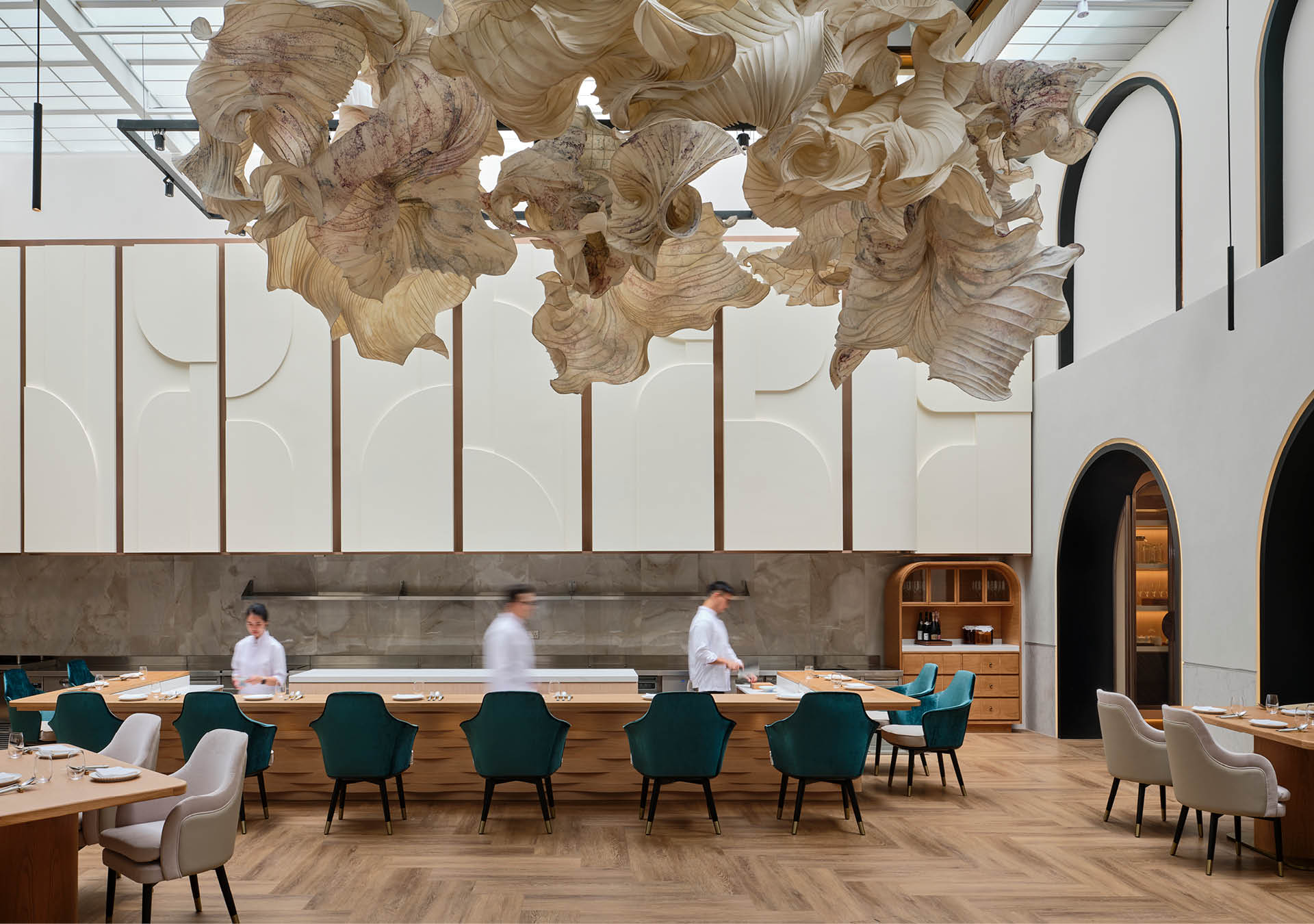 A ceiling display hanging over tables and chairs at Born restaurant, Singapore.