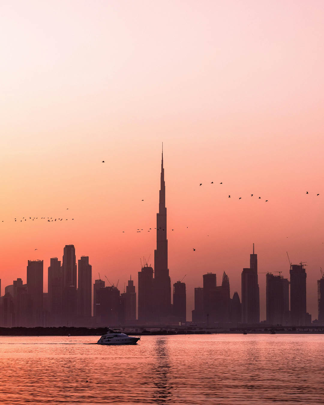 Sunset over the Dubai skyline and Burj Khalifa