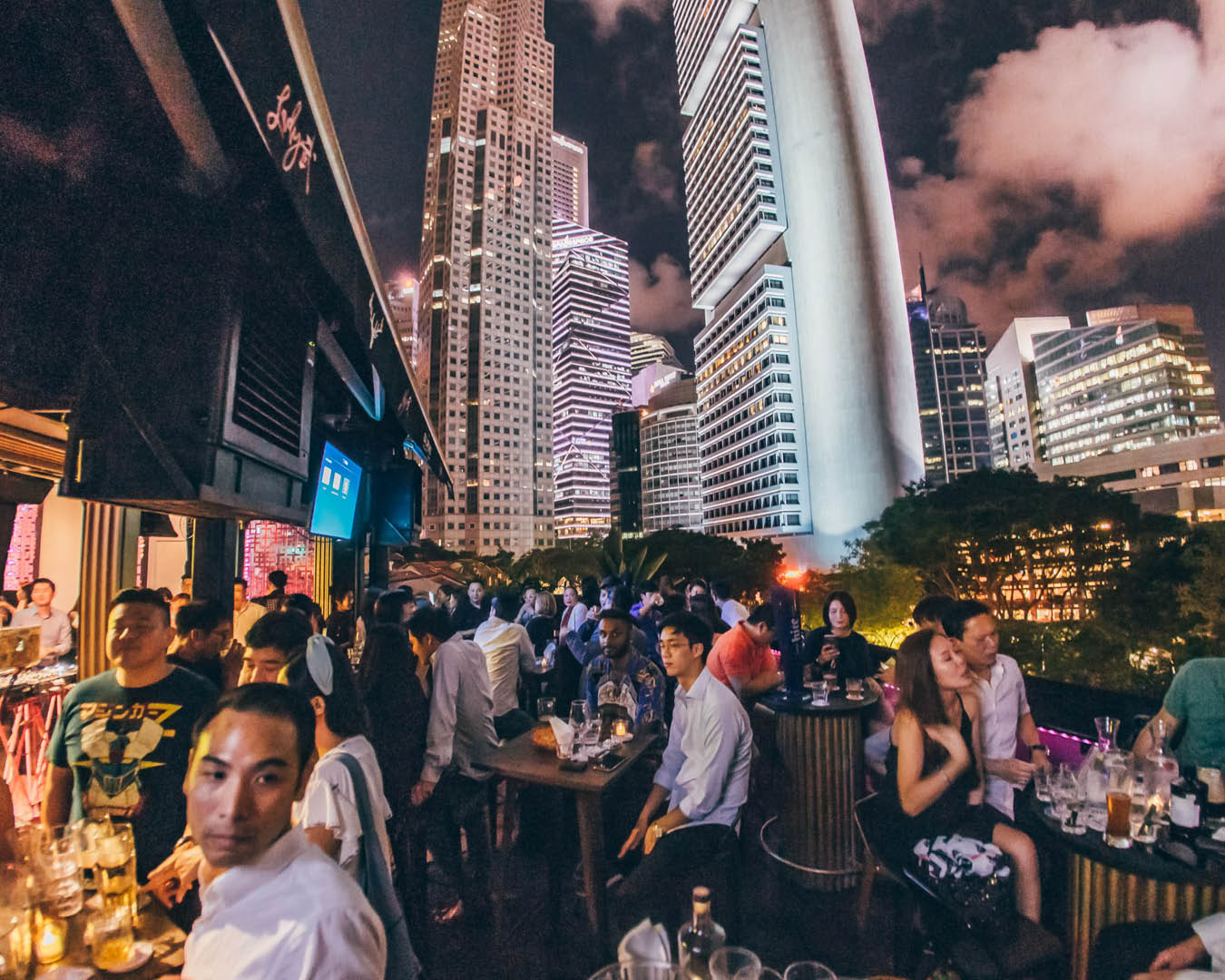 Crowds sat at Lady Wu rooftop bar in Singapore.