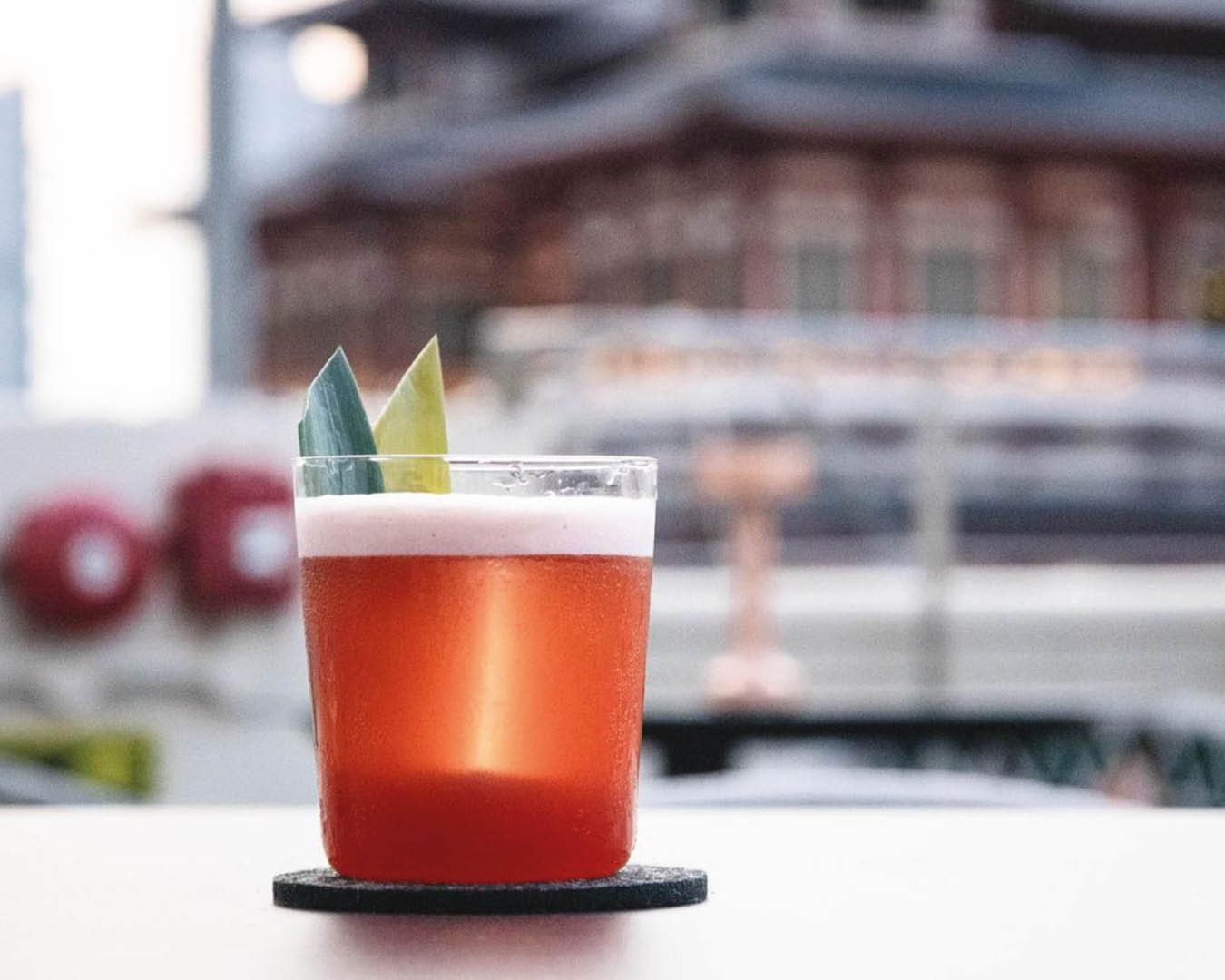 A short cocktail served at Mortar & Pestle rooftop bar in Singapore.