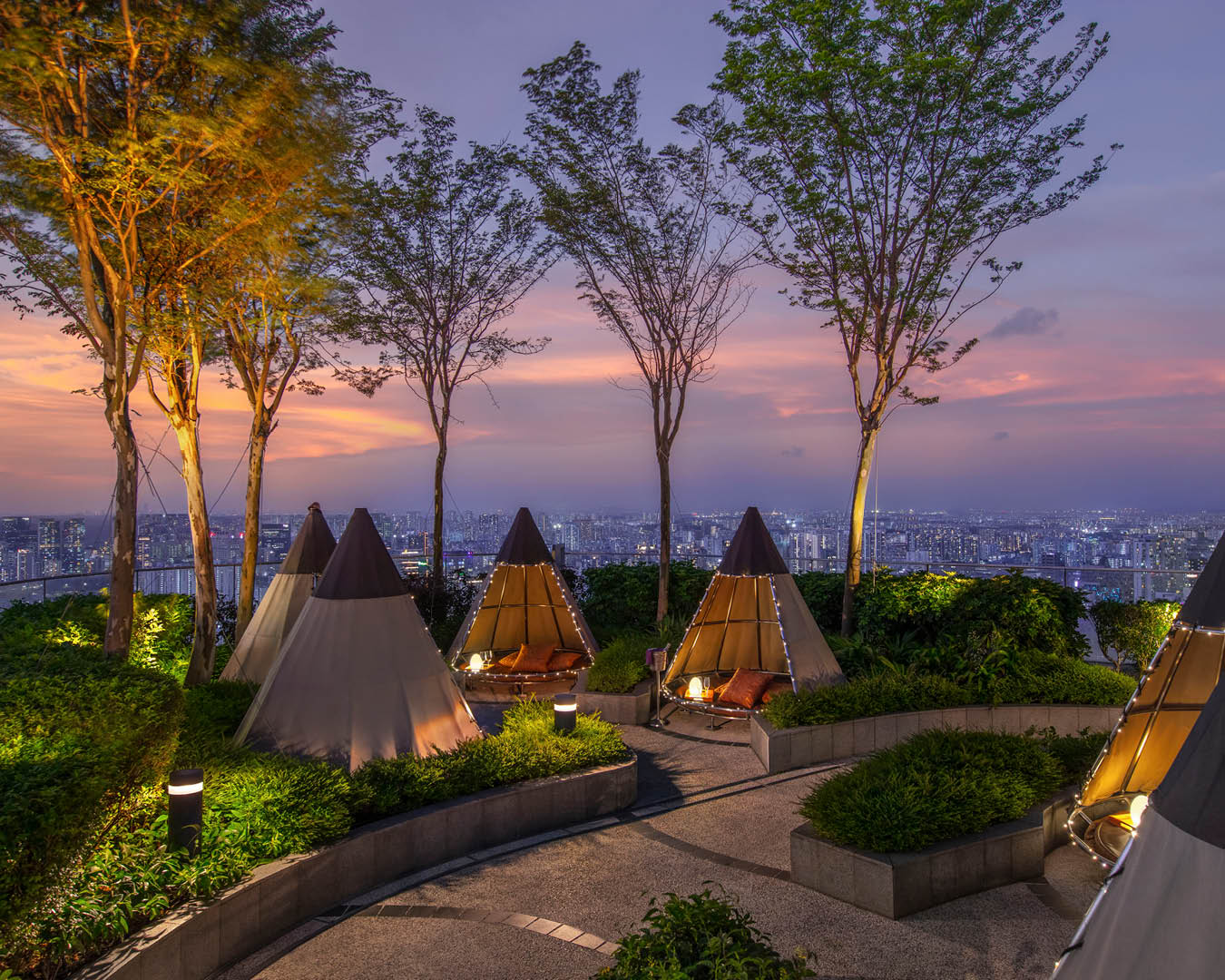 Tipi huts at Mr Stork rooftop bar in Singapore.