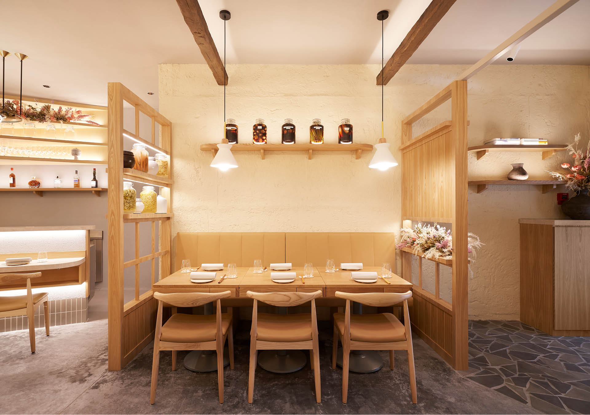 Wood-accented interiors at Nae:um restaurant, Singapore.