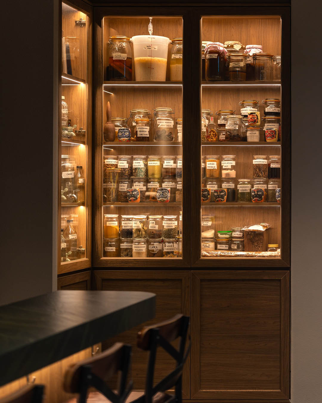 A cabinet filled with jars at The Elephant Room.