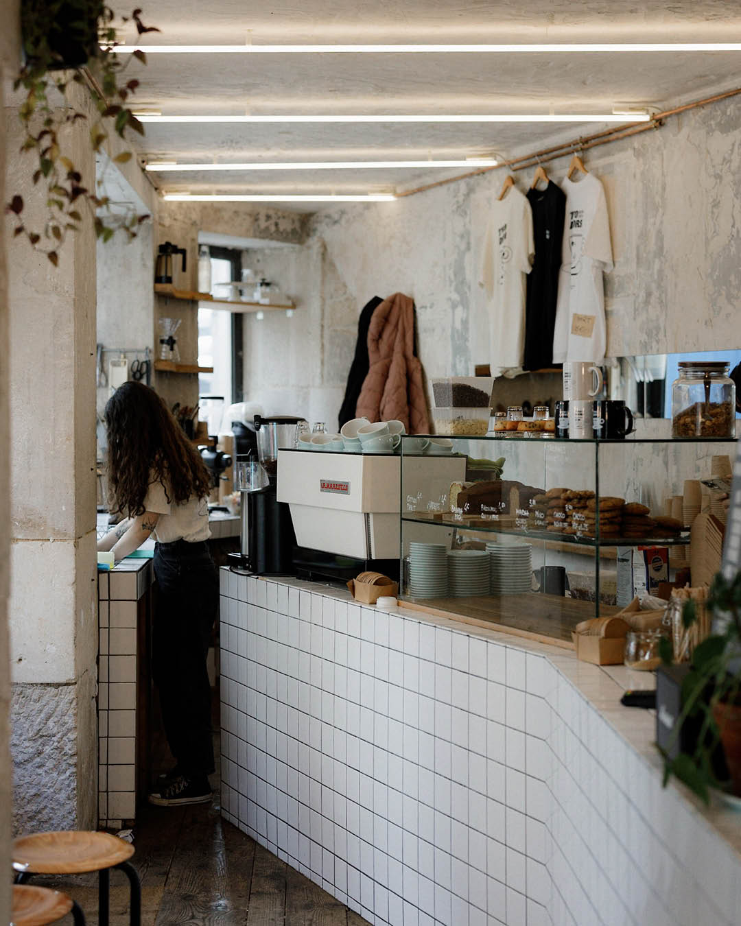 Counter with pastries at Two Doors coffee shop in Paris. Photography by Seb Bicard