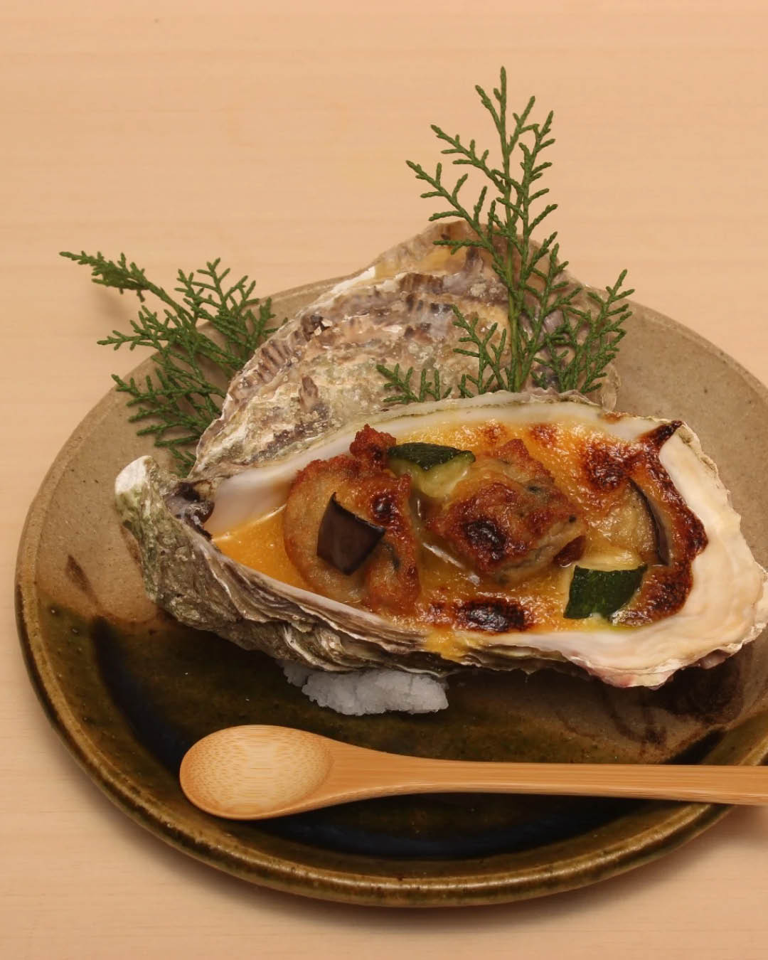 Oyster dish with garnish at Komatsubaki
