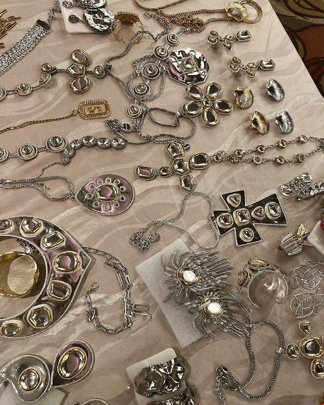 Jewellery on display on a white cloth at Valliyan boutique in Mumbai.