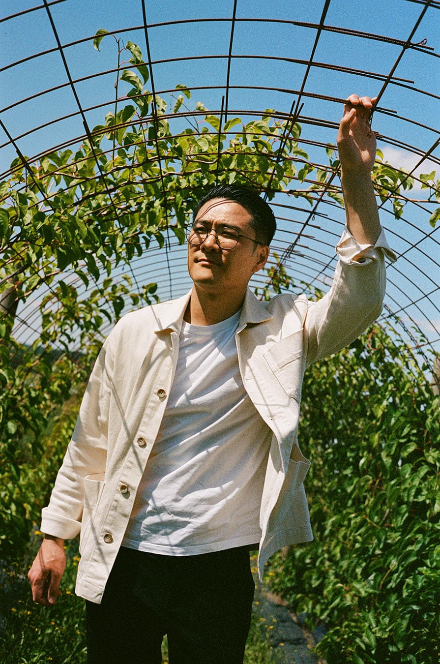 Chef Kristian Baumann in a strawberry field