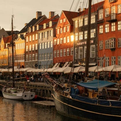people enjoying sunset entertainment along the river in Copenhagen