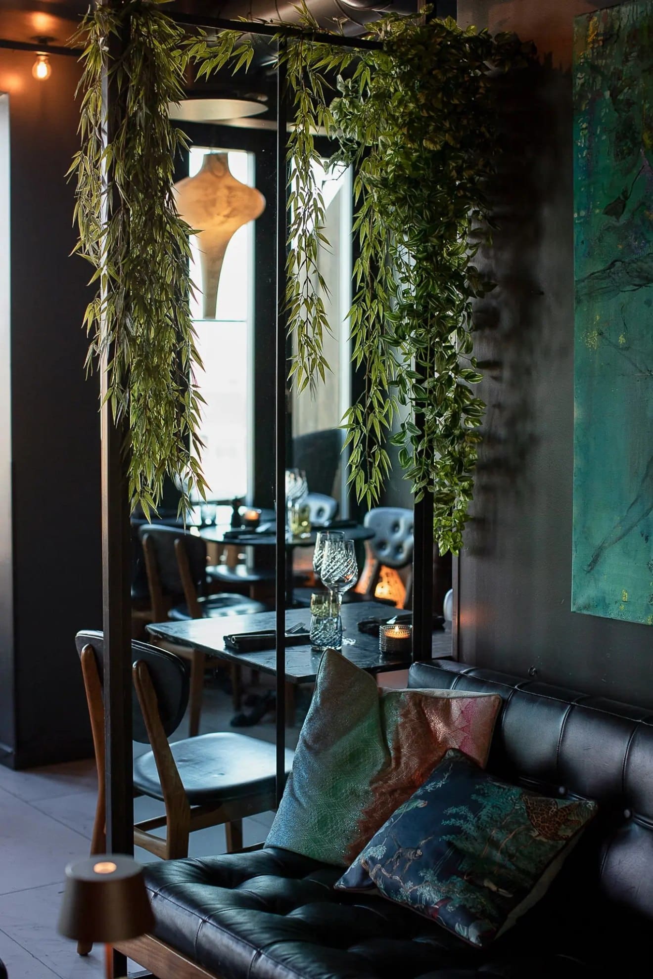Moody interiors and hanging greenery at tropical Manon Les Suites