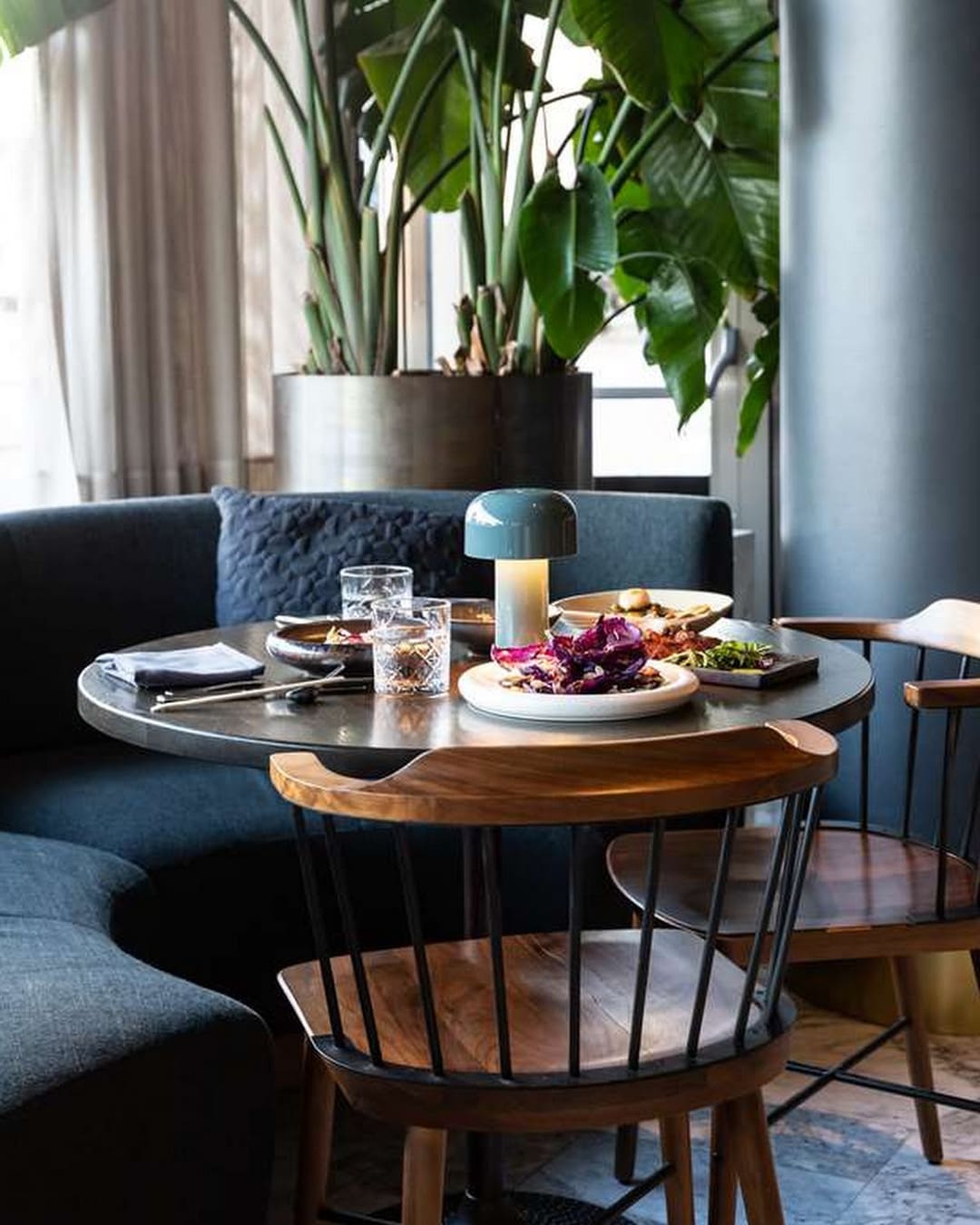 A table with freshly plated food and drinks at Radisson Collection Royal Hotel in Copenhagen