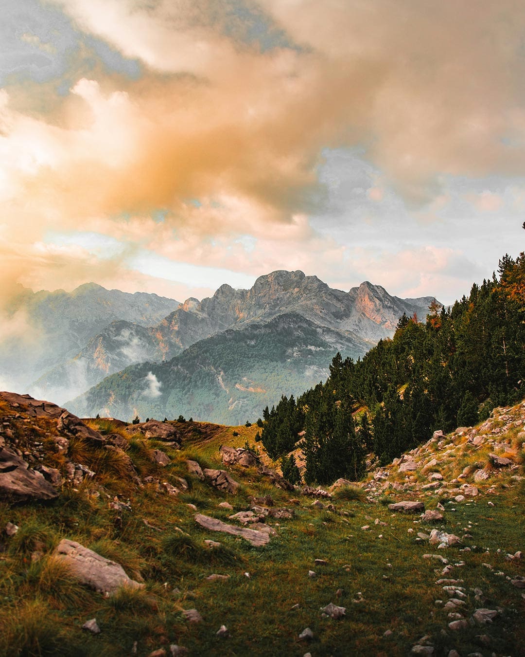 The dramatic, jagged-tooth peaks of the Albanian Alps pictured at sunset