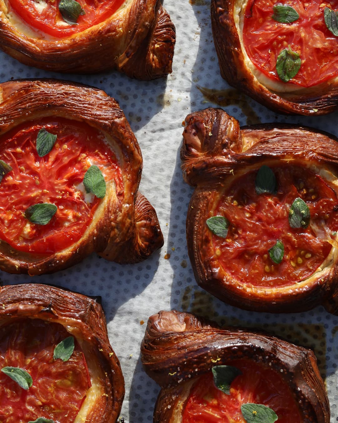 Pastries baked with fresh organic tomatoes, tomato chutney and bechamel sauce, served at Albatross & Venner bakery in Copenhagen.