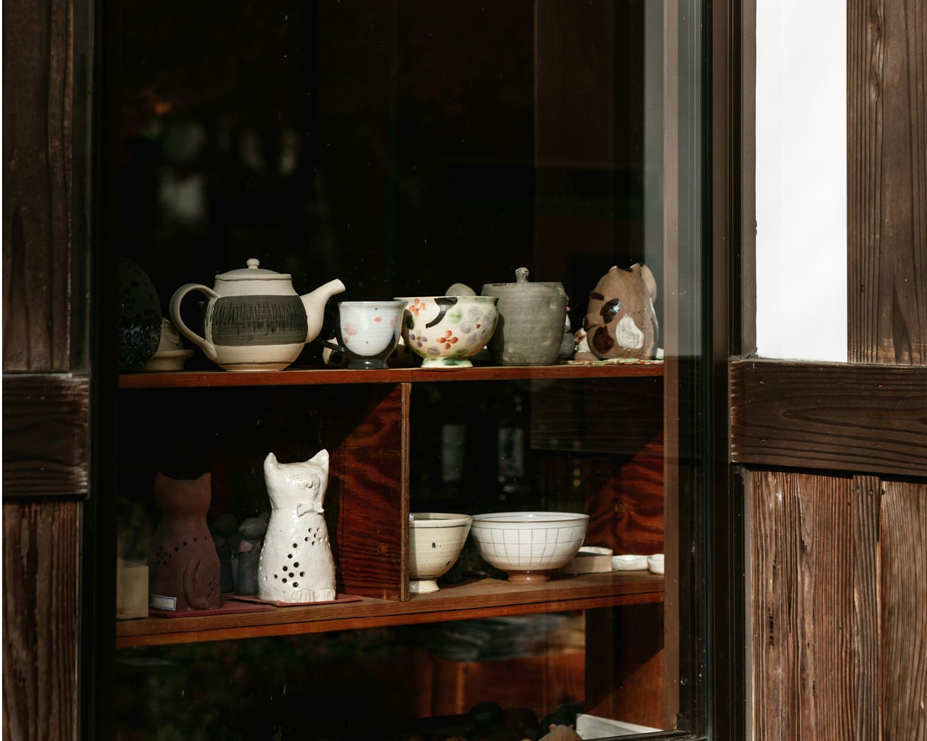 Ceramics on display in a shop window in Kyoto