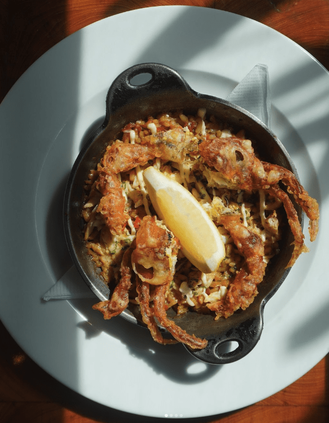 Mud crab rice, garlic butter and soft shell crab served at The Table, in Fort, Mumbai.