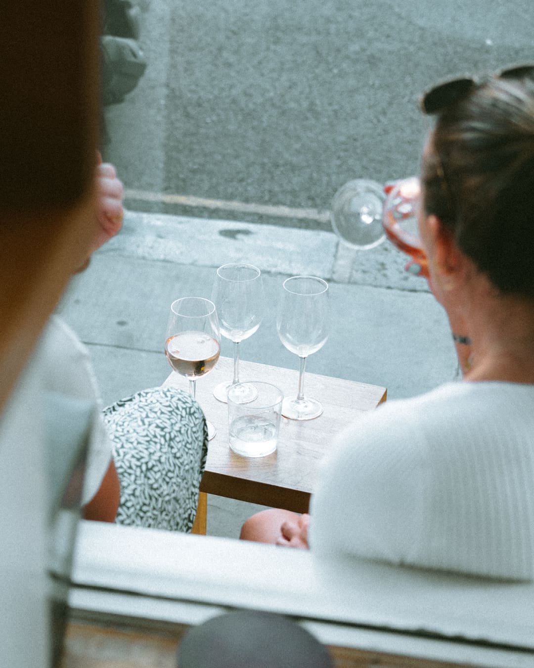 A couple enjoy wine at Kuro Eatery in Notting Hill