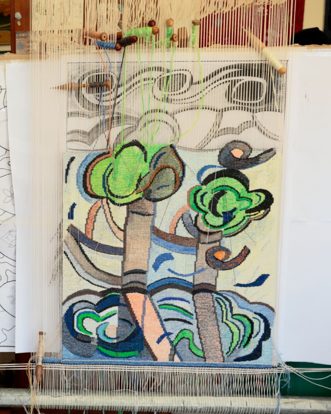 Tapestry work in progress titled 'Planted Together', designed by Emily Ferretti and woven by Jennifer Sharpe, on view at Australian Tapestry Workshop. Photo by Tim Gresham