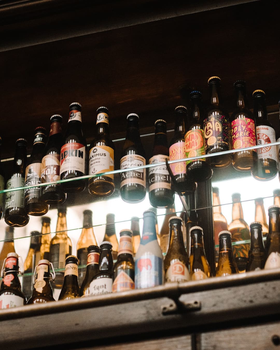 Beers on a shelf at Belgisch Biercafe Olivier in Utrecht.