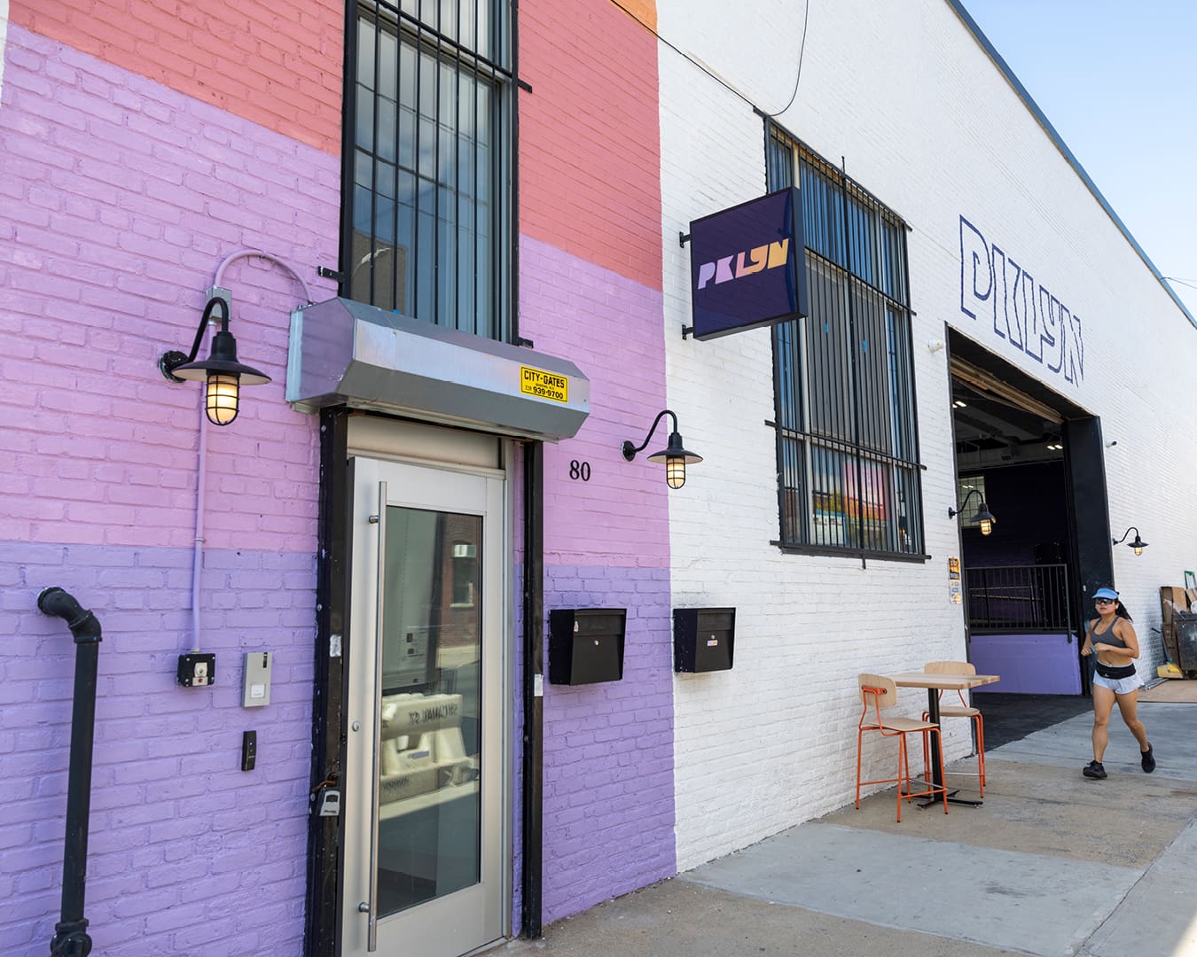 The colourful exterior of PKLYN pickleball venue in New York