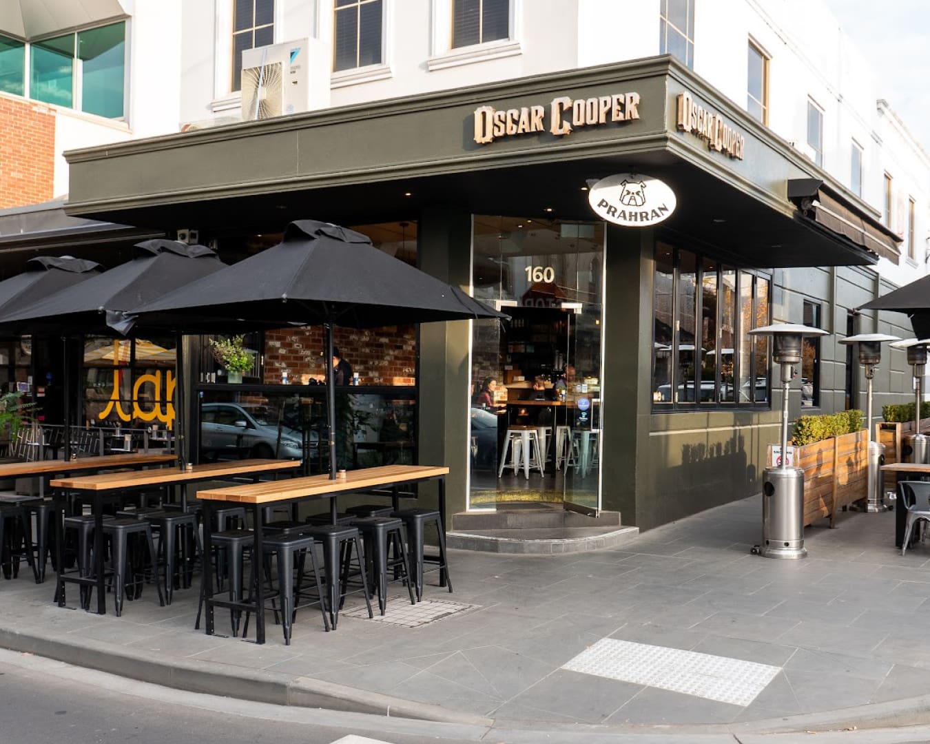 Outdoor seating outside Oscar Cooper cafe in Melbourne