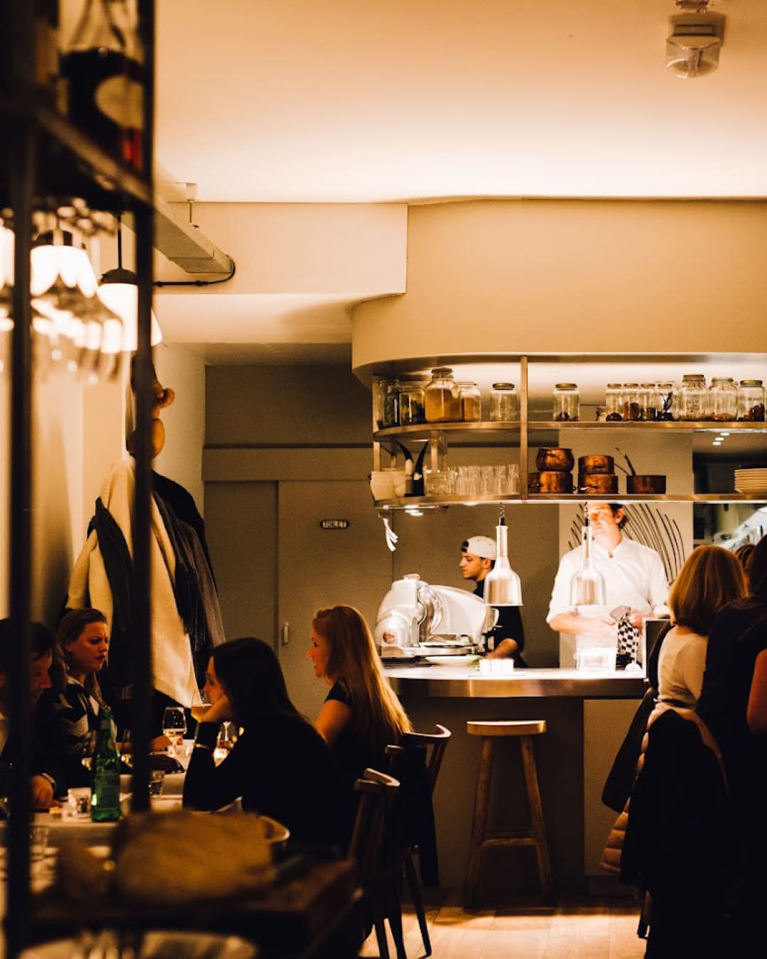 Chefs at work in an open kitchen at Concors restaurant in Utrecht.