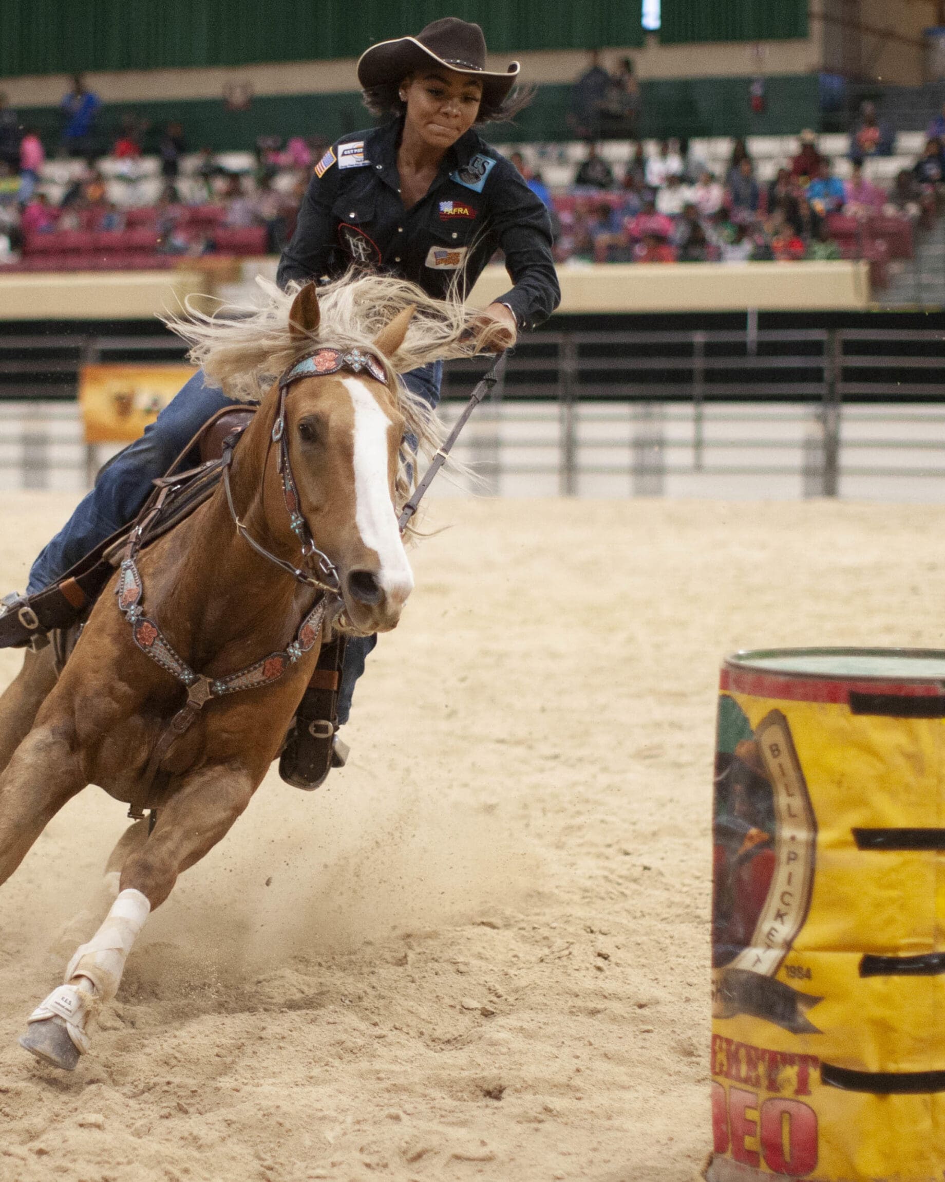 Barrel racing at the Bill Pickett Invitational Rodeo