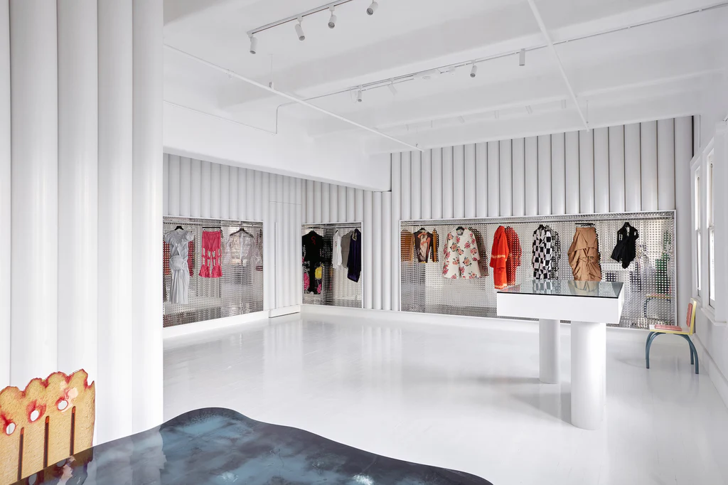 An all-white space featuring archival Japanese fashion at Dot Comme in Melbourne