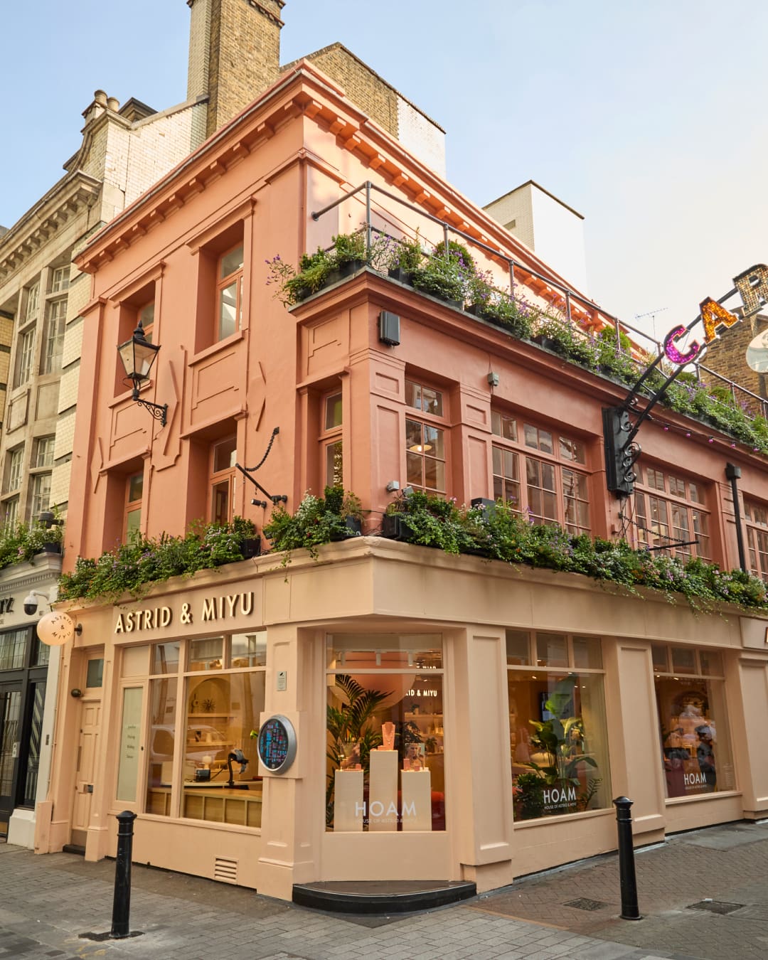 The pink exterior of House of Astrid & Miyu in Soho