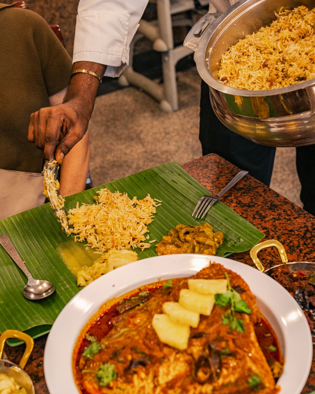 Fish head curry, served on a banana leaf at Banana Leaf Apolo in Singapore. Photo by Lauryn Ishak
