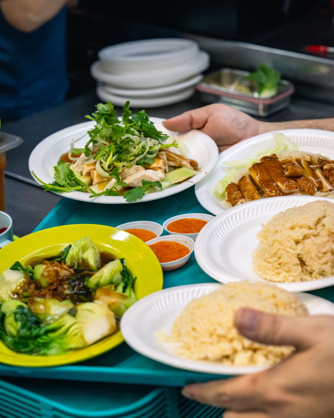 Hainanese chicken rice at Tian Tian Hainanese Chicken Rice stall in Maxwell Food Centre, Singapore. Photography by Lauryn Ishak