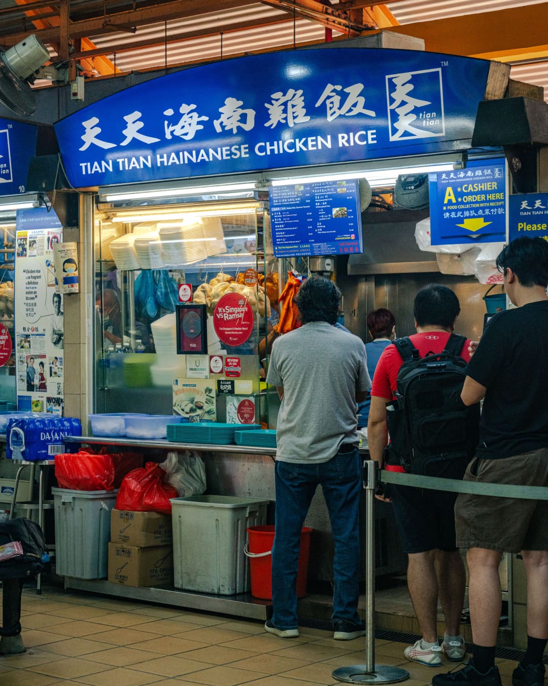 Eating at Tian Tian Hainanese Chicken Rice stall in Maxwell Food Centre, Singapore. Photography by Lauryn Ishak