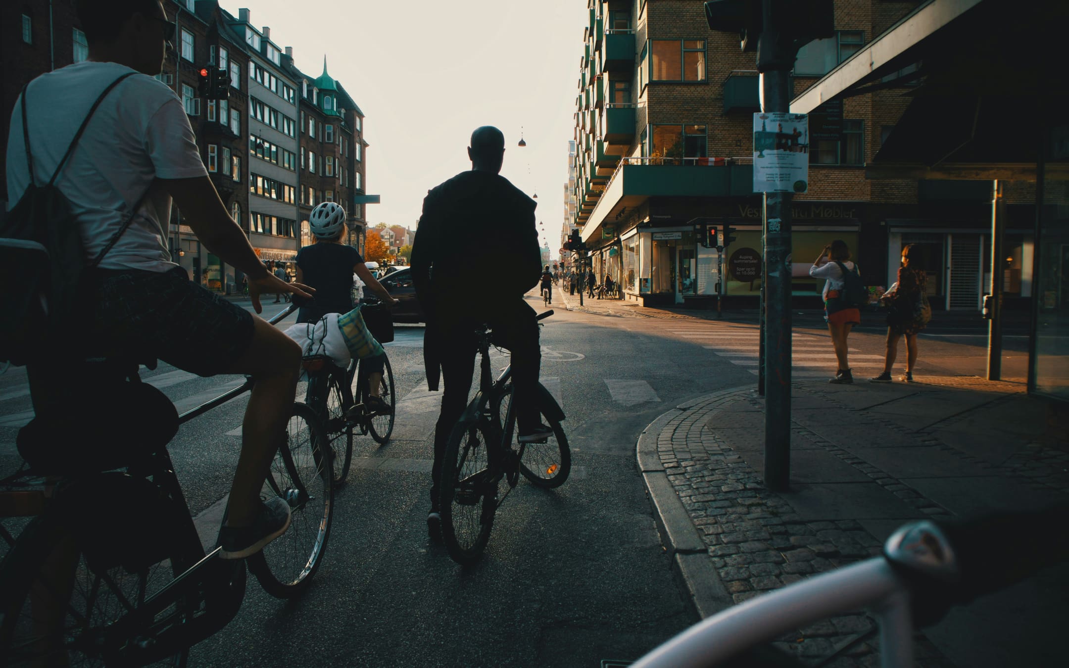 Locals and tourists commuting on bikes in Copenhagen