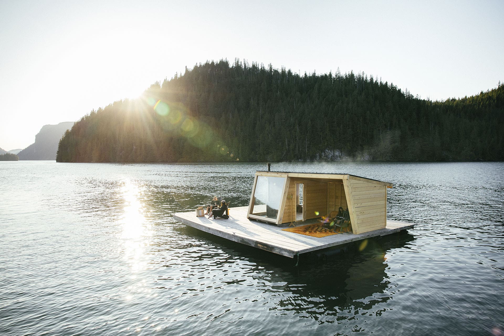 A floating Sauna Dock in a wild lake wilderness. Nimmo Bay Wilderness Experience