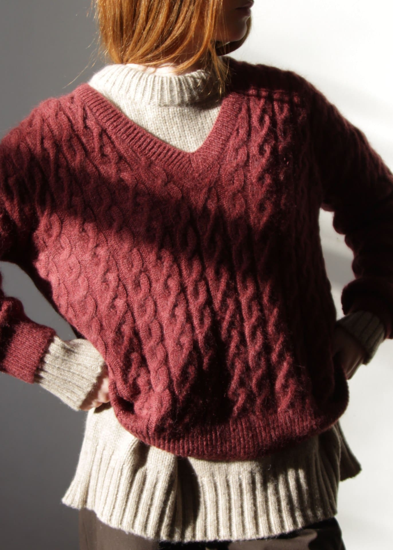 A women in a red jumper at Bruce, Melbourne vintage shop