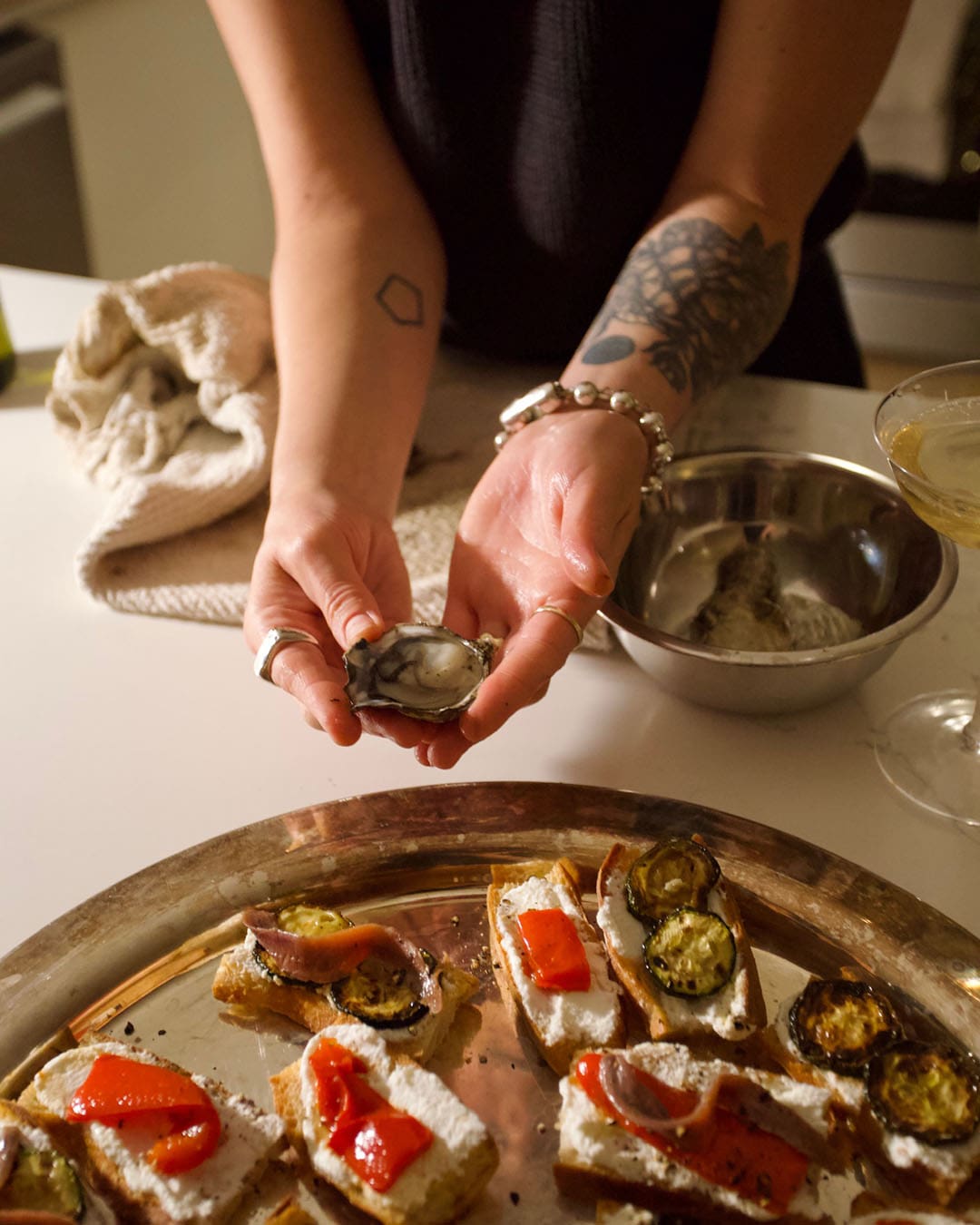 Chloe Walsh prepares oysters for her guests