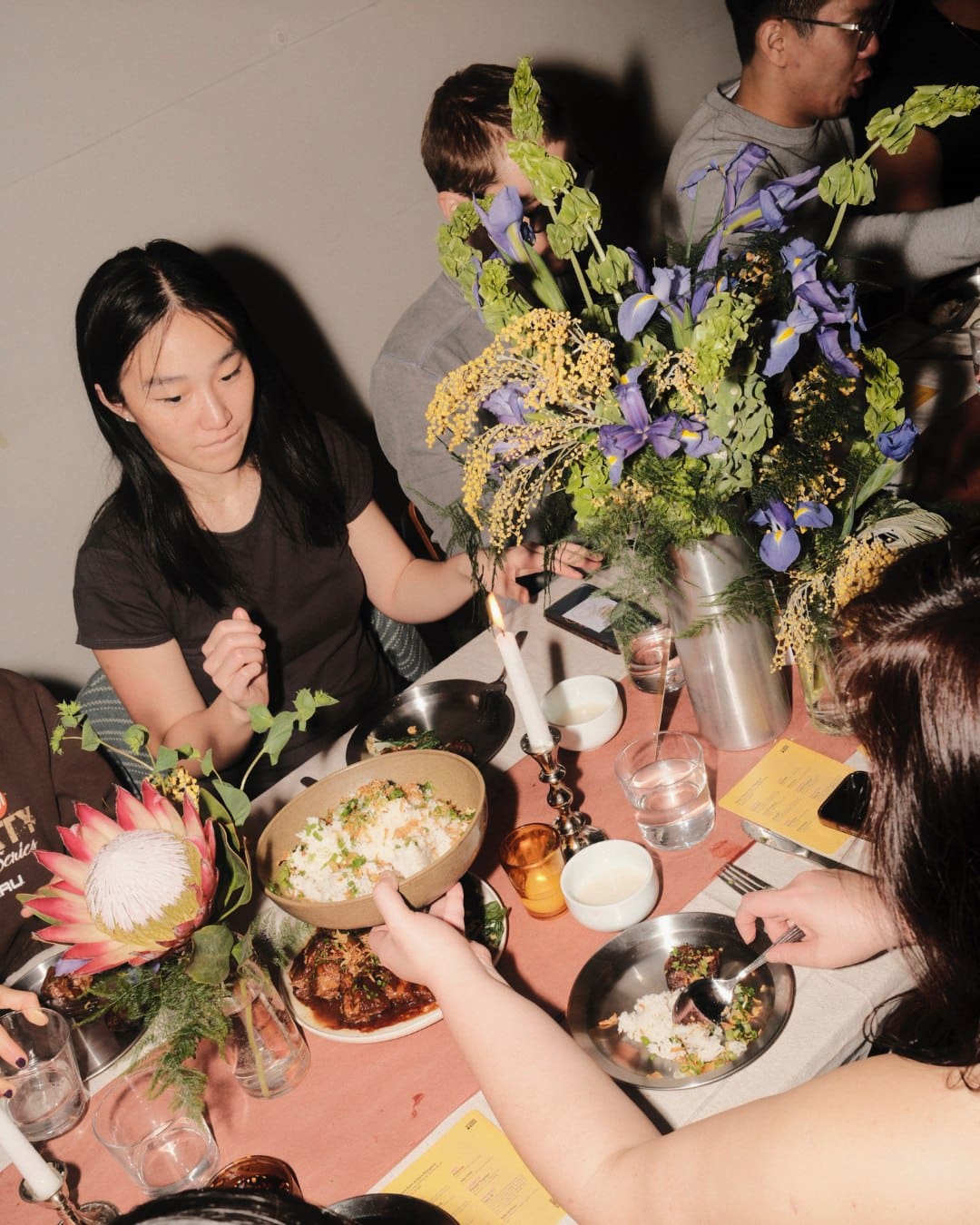 Family-style dishes over a table at Studio Bumi in New York