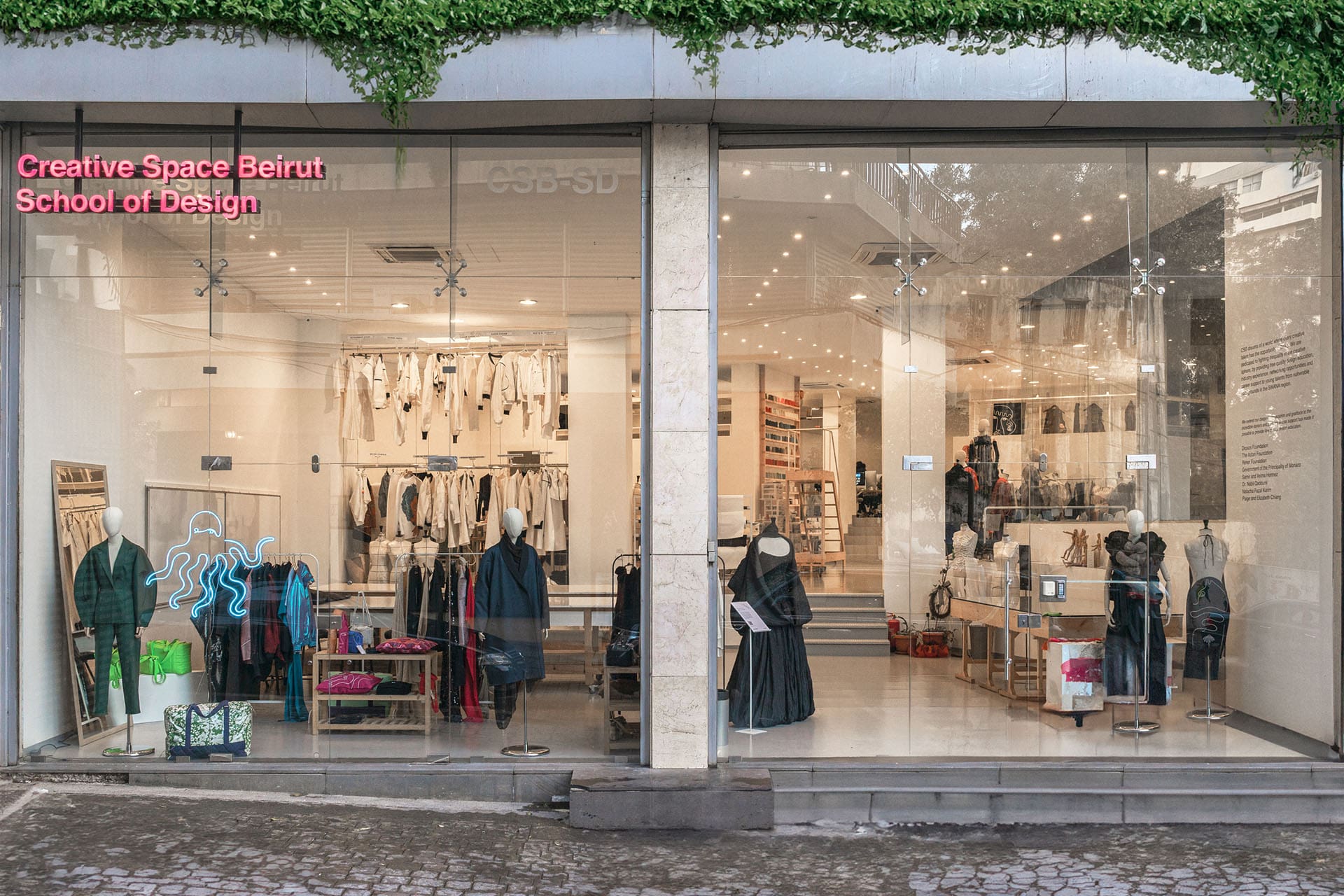 The exterior of Creative Space Beirut in Beirut, with innovative clothing designs in the window