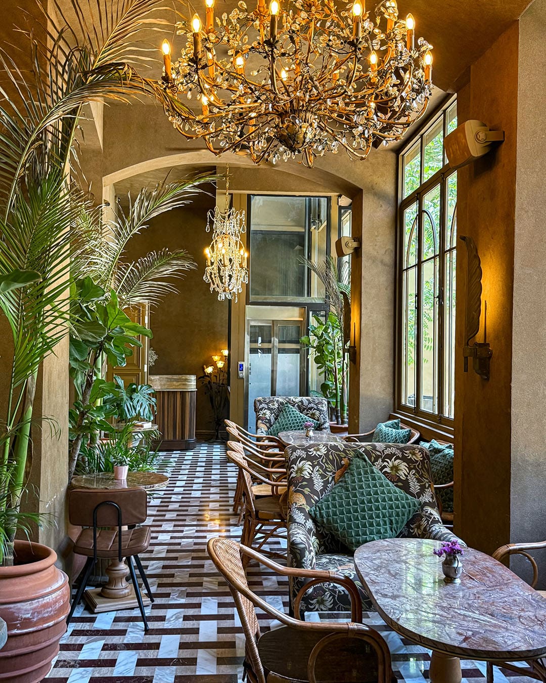 Hotel Lost, Beirut, with patterned tiles and towering ferns