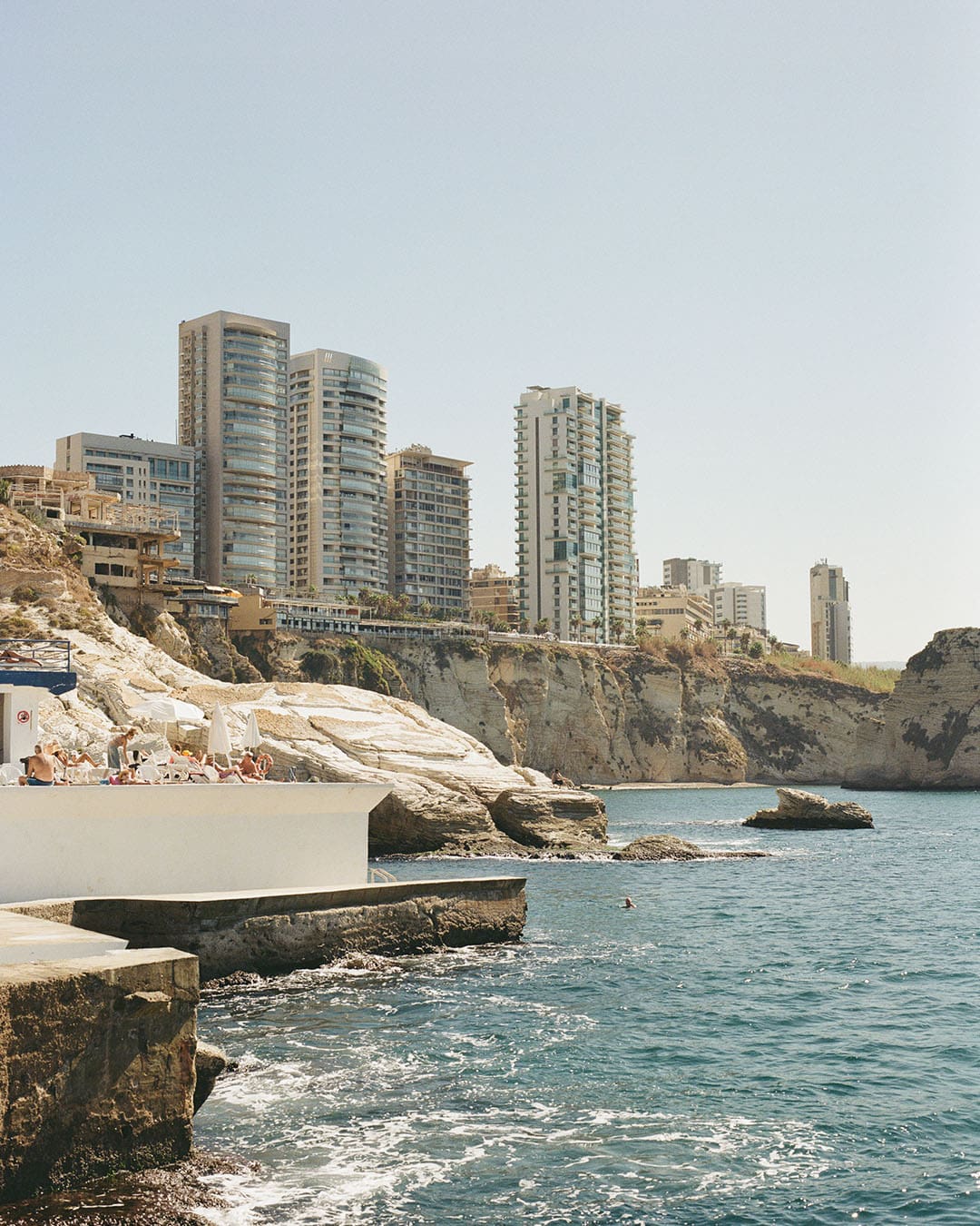Beirut, showcasing beach and city. Photography by Tanya Traboulsi