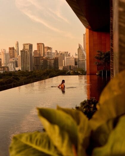 Woman swims in pool