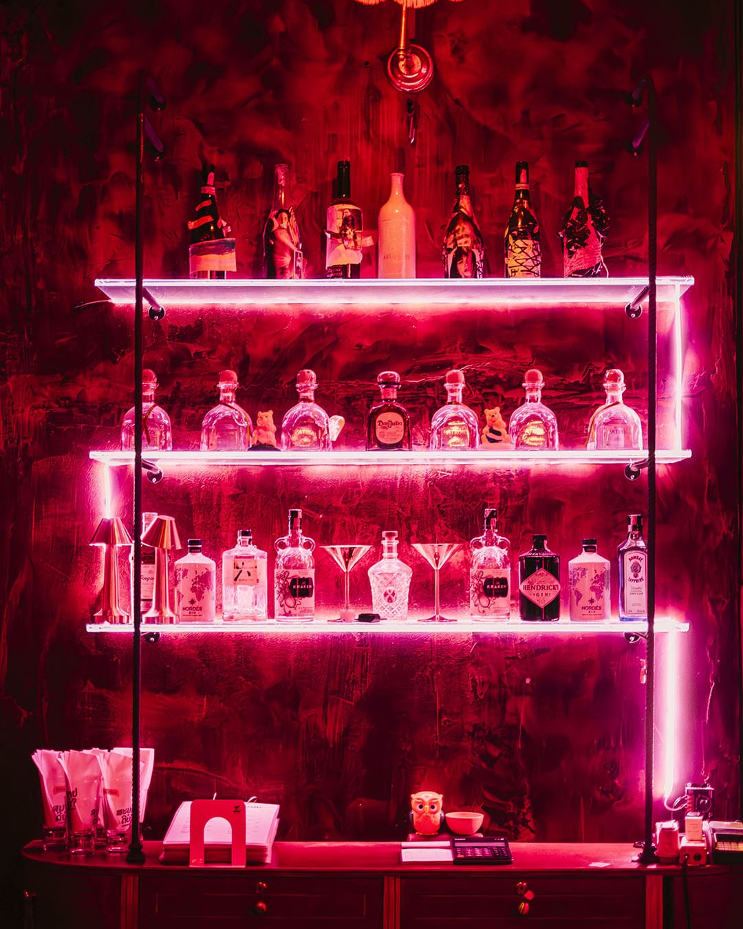 The red neon lit bar at Smalls Jazz Bar in Bangkok