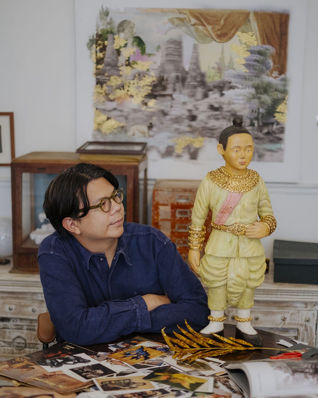 Nakrob Moonmanas and his artwork, The Little Prince in his studio. Photography by Adam Birkan