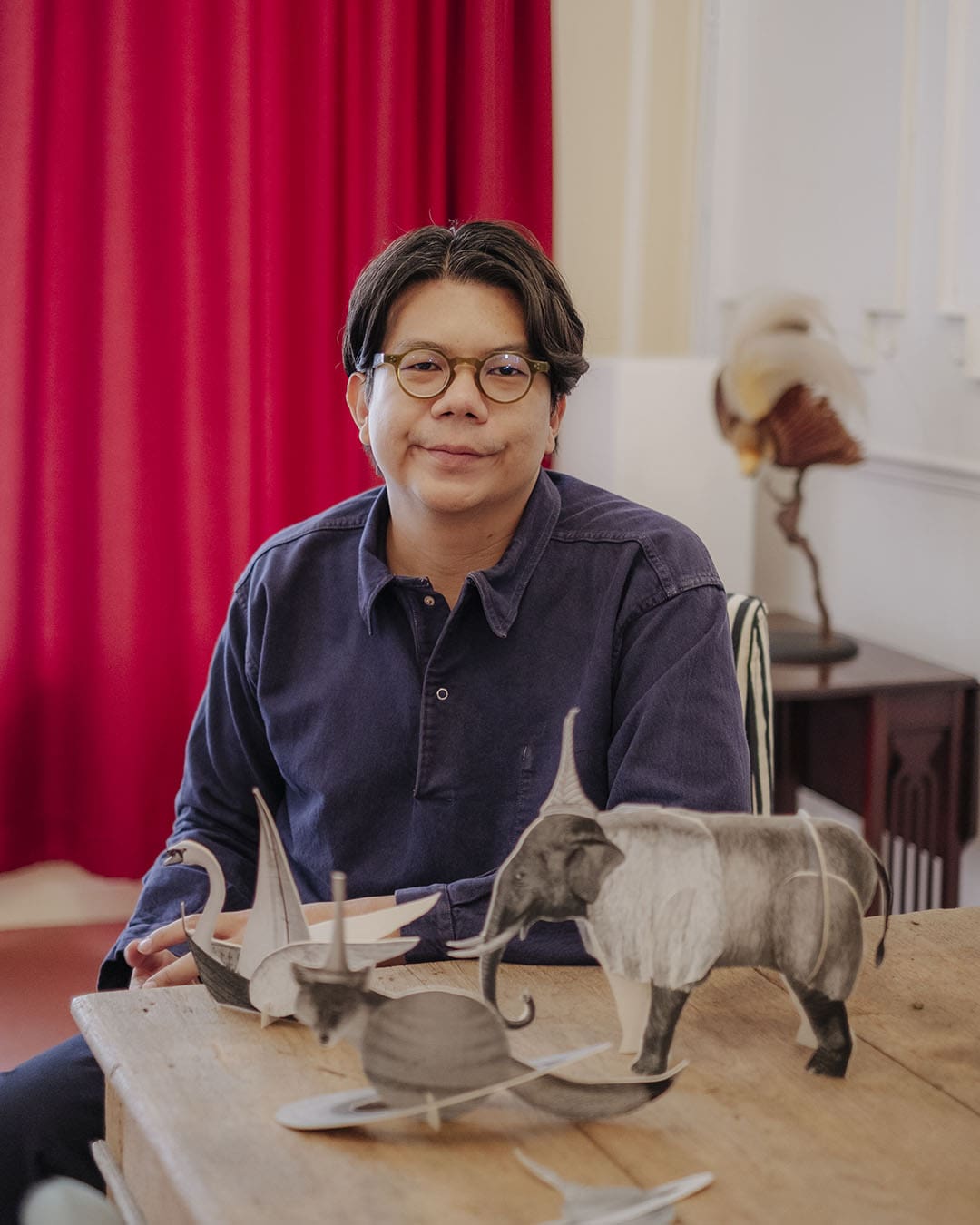 Nakrob Moonmanas and his collection of tableware animals. Photography by Adam Birkan