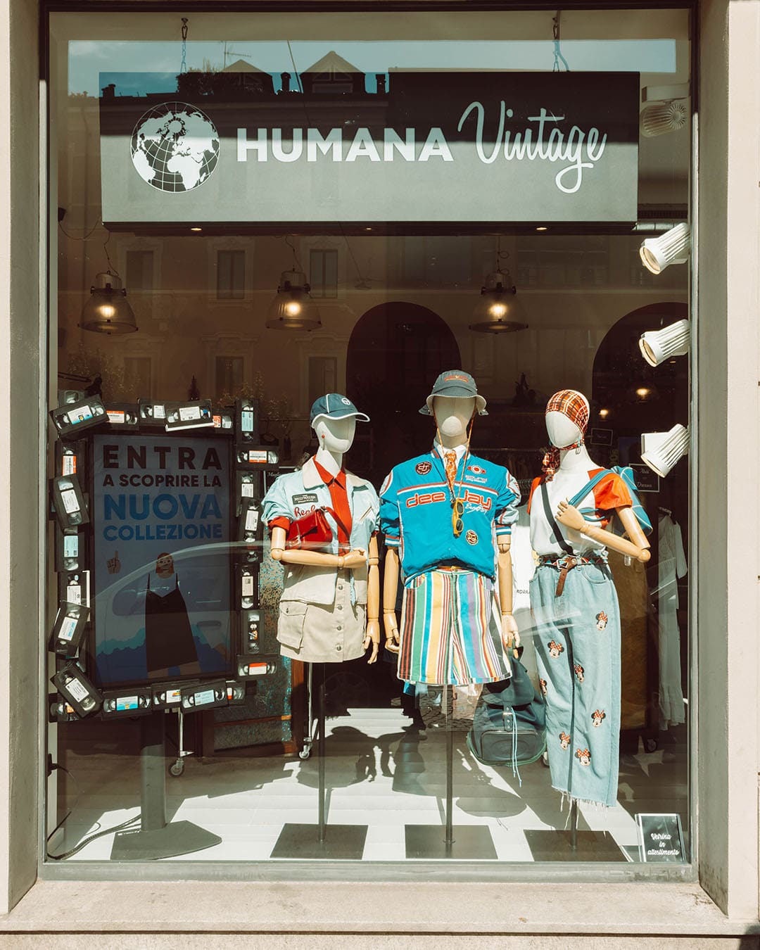Vintage fashions in the window of Humana Vintage in Milan