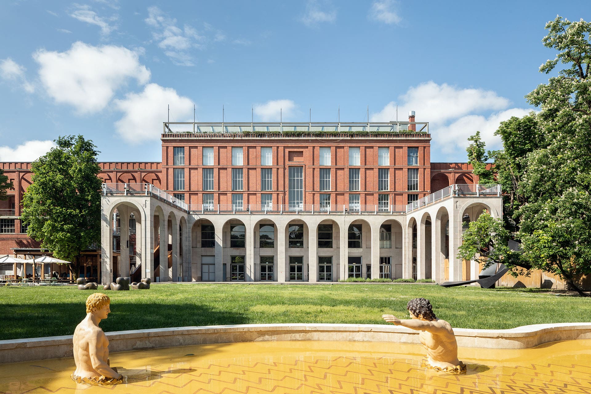 The exterior of Triennale Milano on the edge of the park