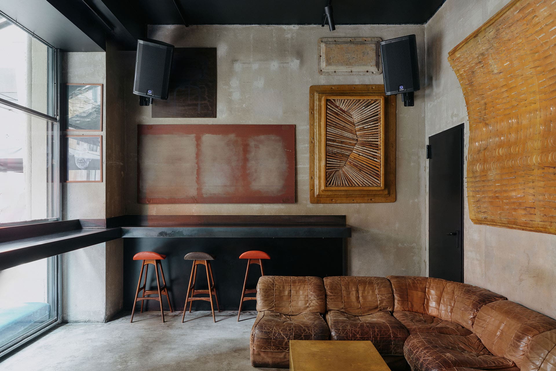 Concrete, steel, brass and oxidised copper come together at STRAF hotel