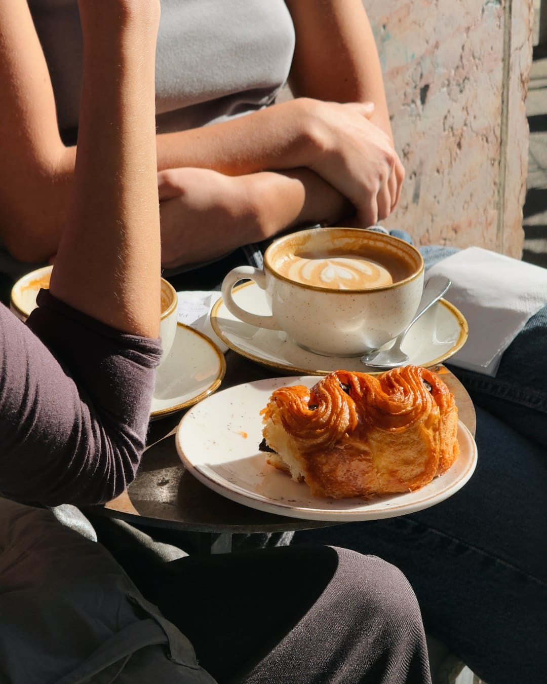 Al fresco coffee and sizeable pastries at SISU